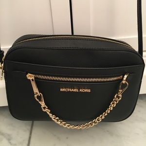 Michael Kors Jet Set Large Saffiano Leather Crossbody bag.